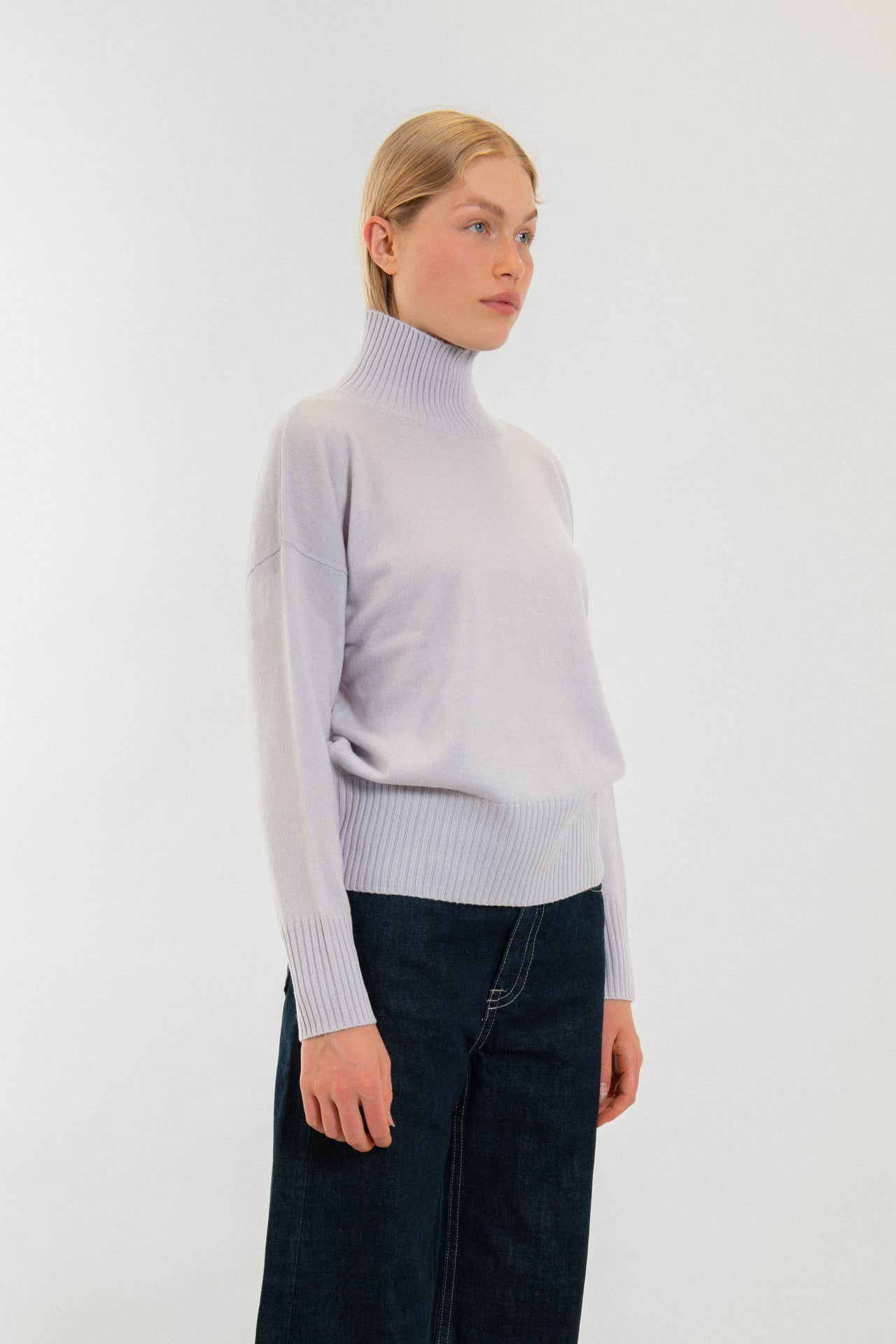 100% Cashmere sweater with a stand up turtle-neck collar