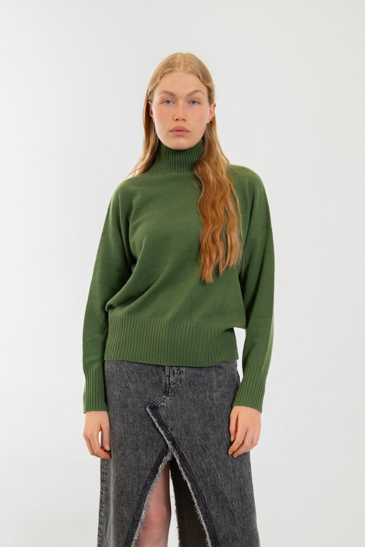 100% Cashmere sweater with a stand up turtle-neck collar